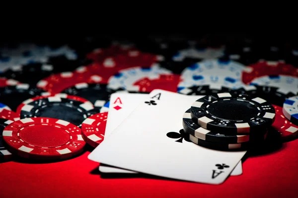 Live Caribbean Stud Poker table with professional dealer and multi-camera broadcast